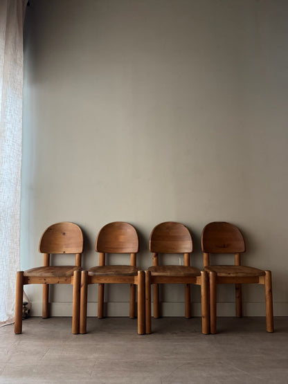 Rainer Daumiller pine dining chairs with matte finish. Sold as a set of 4.