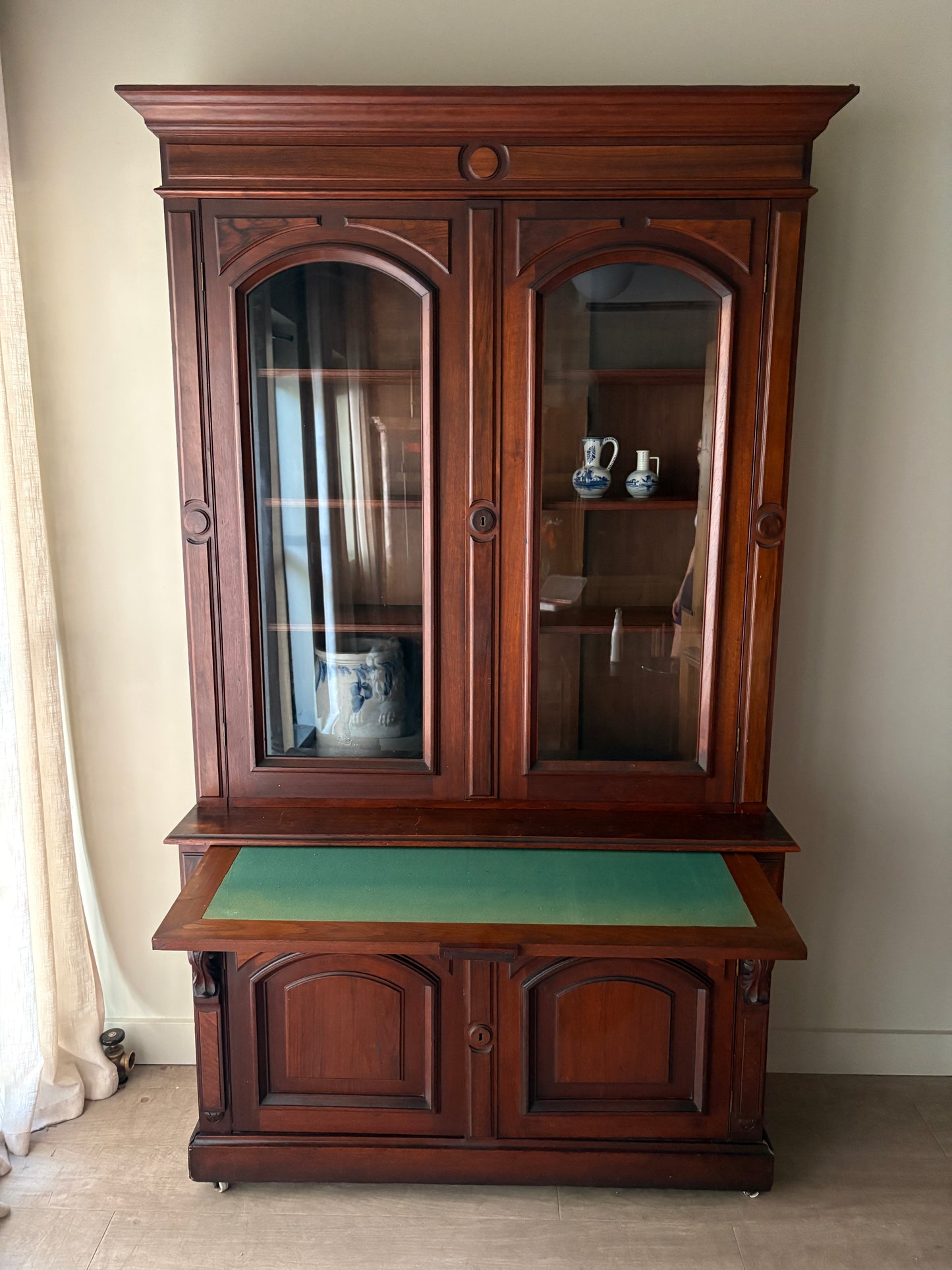 Victorian walnut two piece display hutch with writing slide