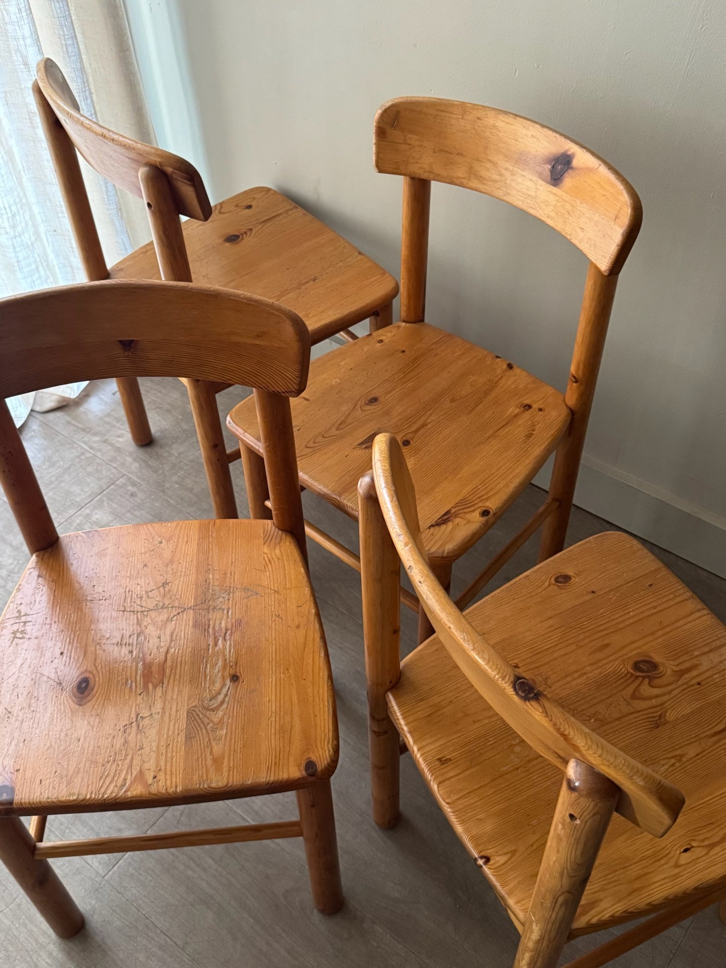 Danish pine dining chairs. Sold in pairs.