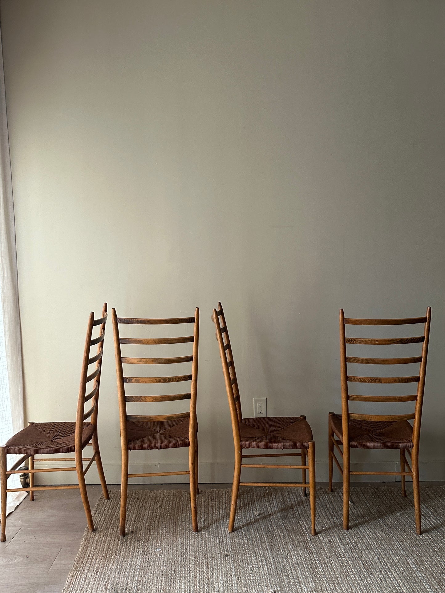 Woven ladder back chairs. Sets of 2.