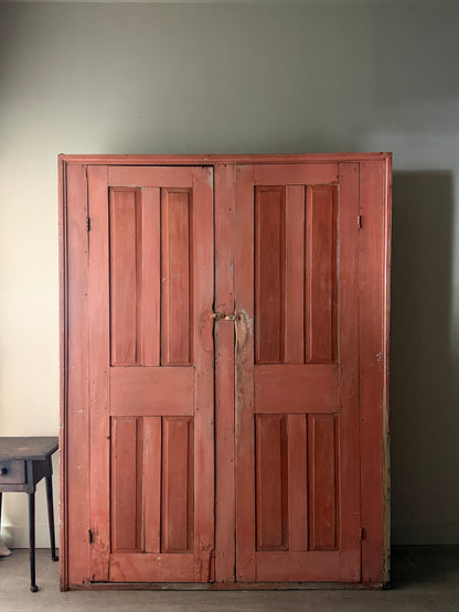 Salmon painted pine cupboard