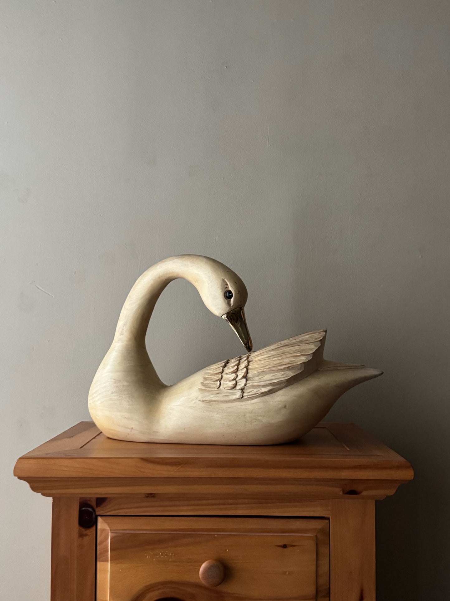 Carved swan sculpture