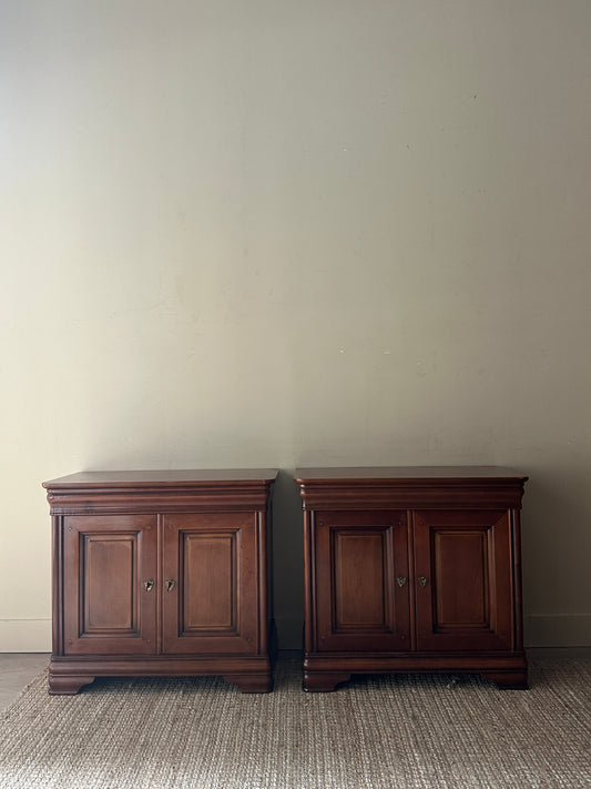 Pair of walnut nightstands. Sold together.