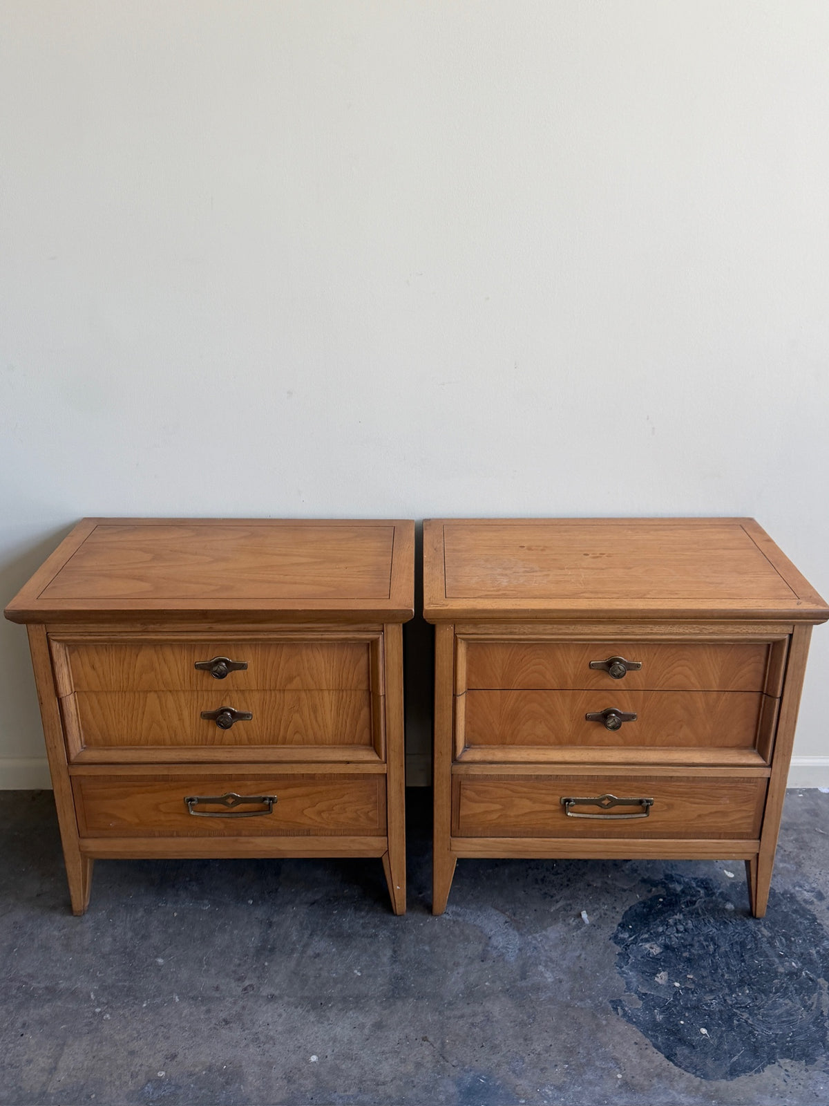 Walnut nightstands. Sold as a pair.