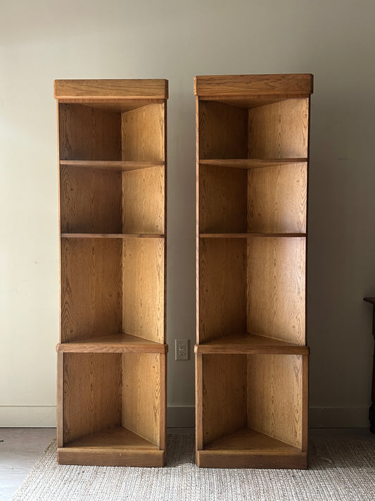 Laminate oak corner shelves. Sold individually.