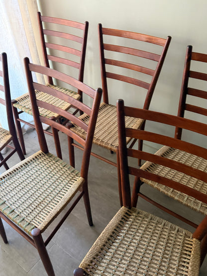 Chiavari Spinetto ladder back dining chairs with wicker cord seats. Sold as a set of 6.
