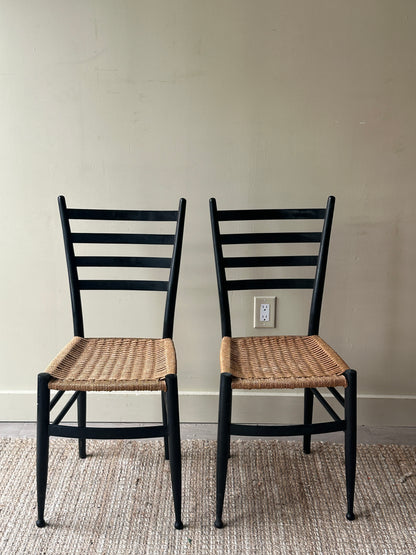Pair of woven dining chairs. Sold as pair.