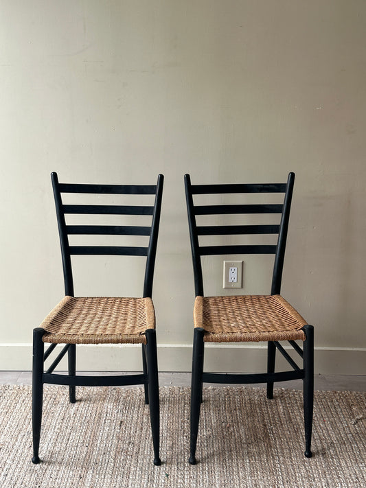 Pair of woven dining chairs. Sold as pair.