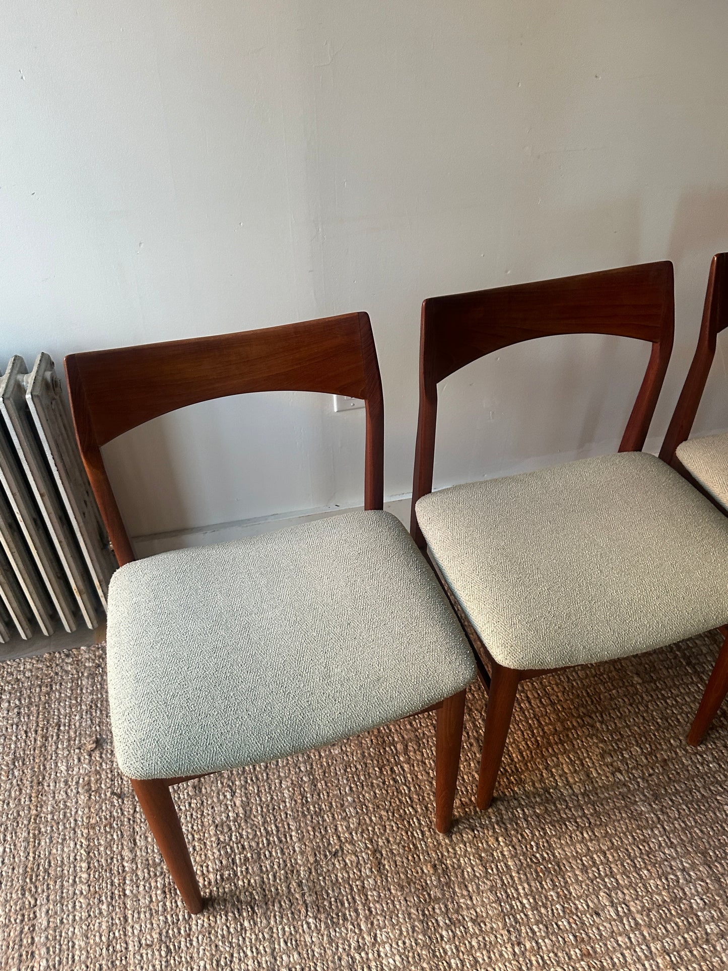 Teak dining chairs. Sold as a set of 4.