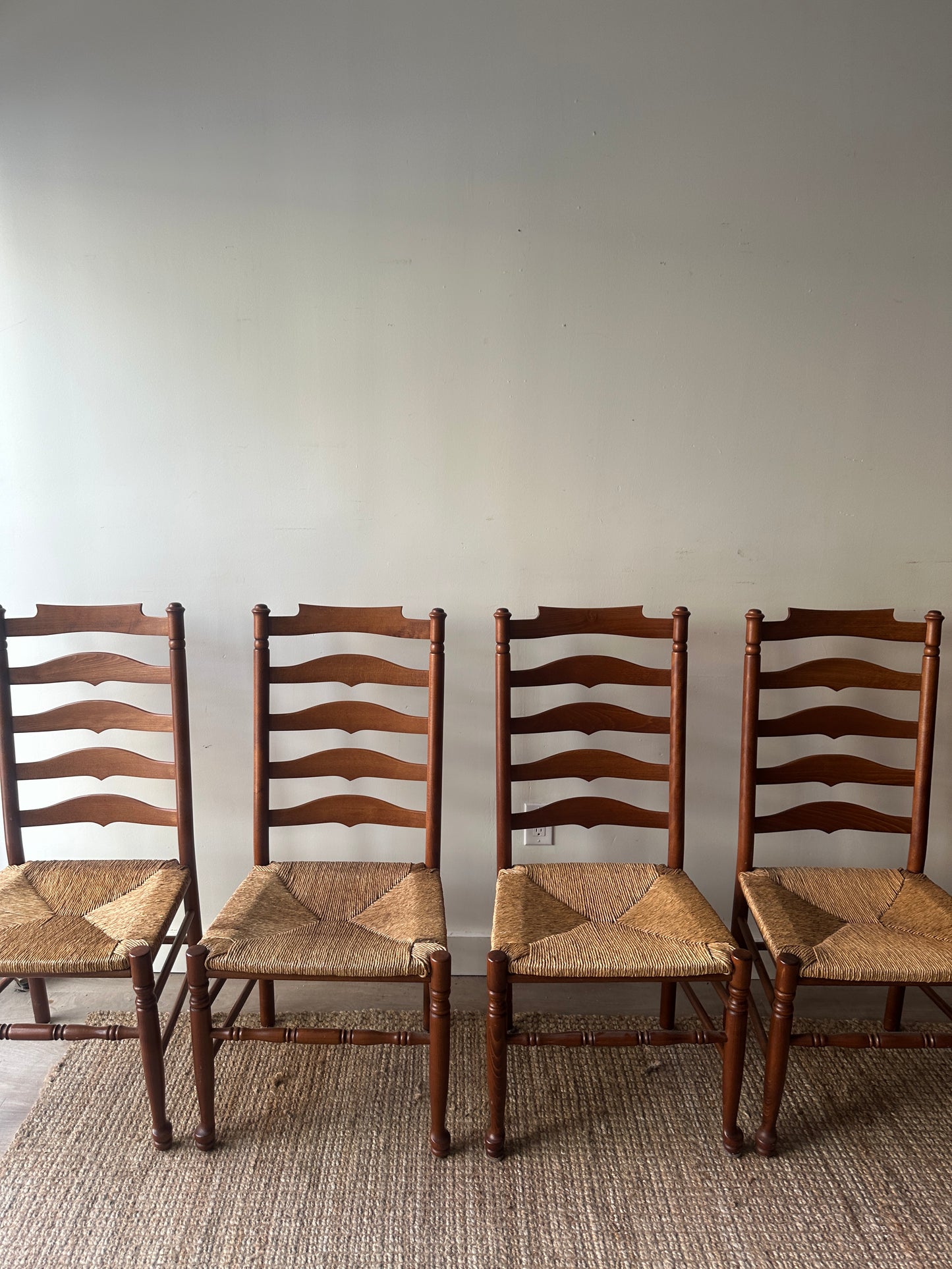 Set of 4 ladder back chairs. Sold as a set.
