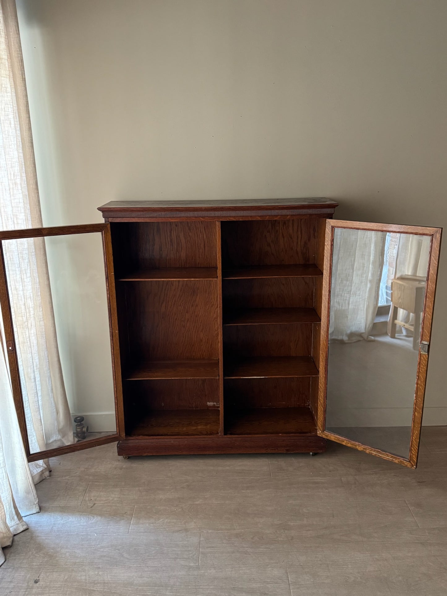 Golden oak display cabinet