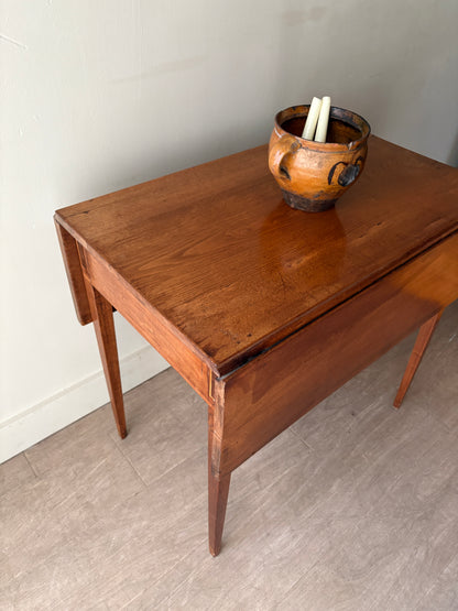 Inlaid walnut drop leaf table