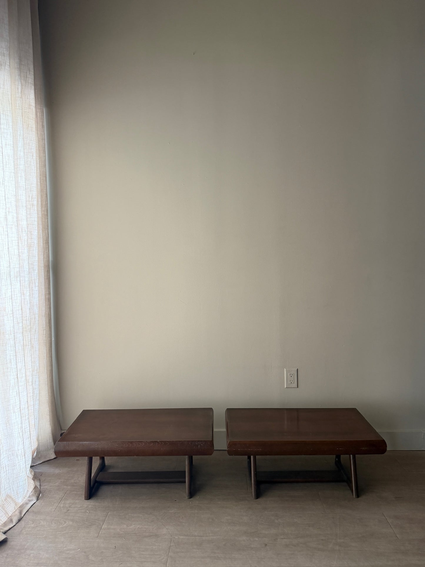 Walnut coffee tables. Sold individually.