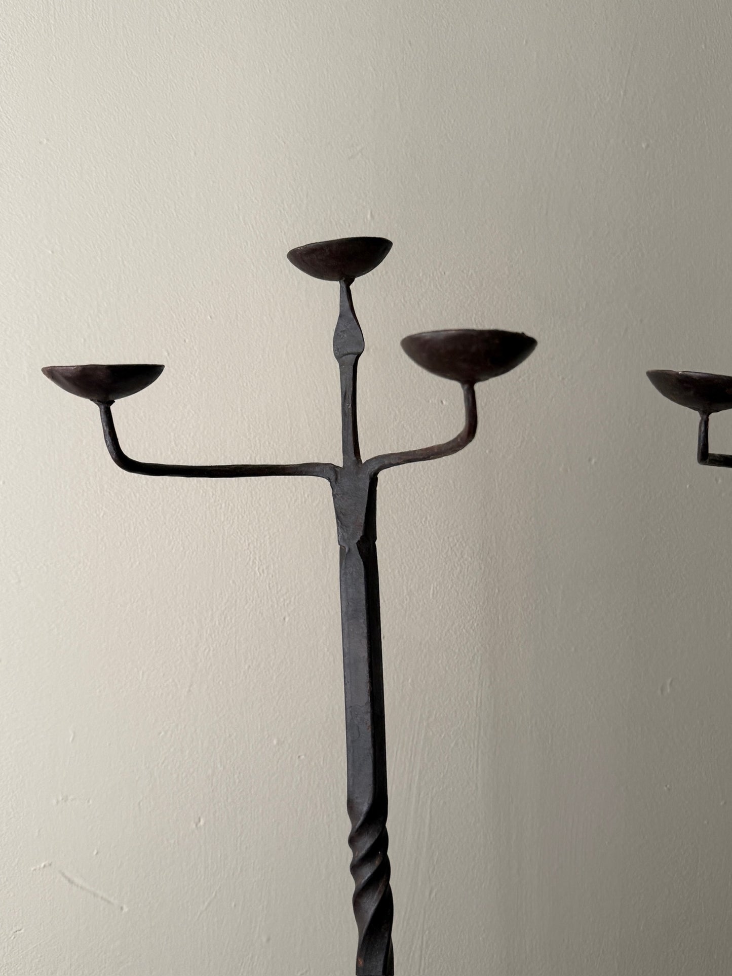 Pair of wrought iron candelabras