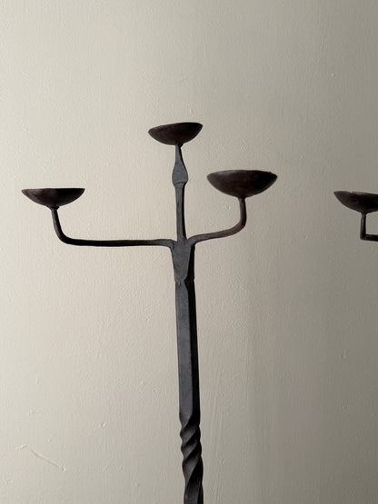 Pair of wrought iron candelabras