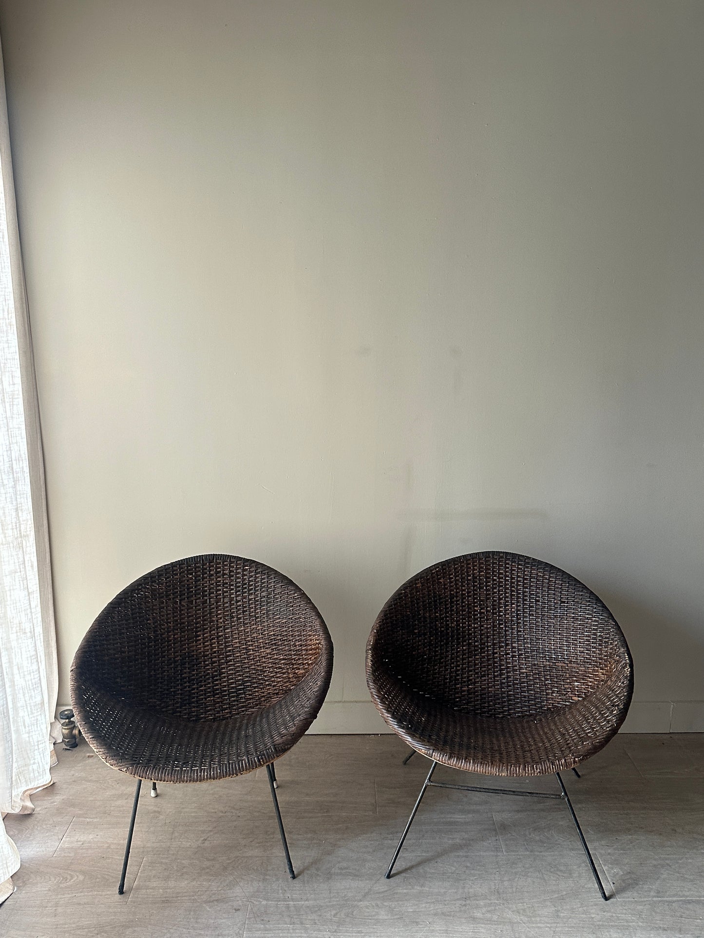 Woven rattan hoop chairs. Sold individually.