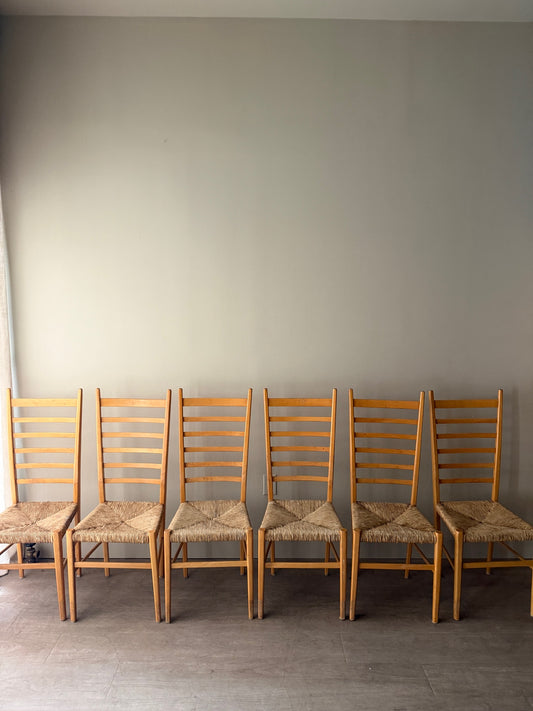 Maple ladder back dining chairs with rush seats. Sold in pairs.
