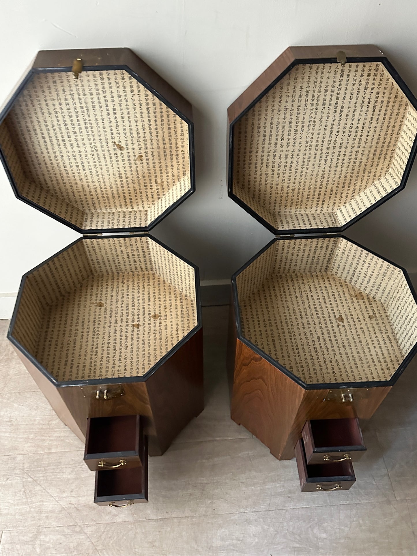 2 octagonal rosewood side tables. Sold individually.