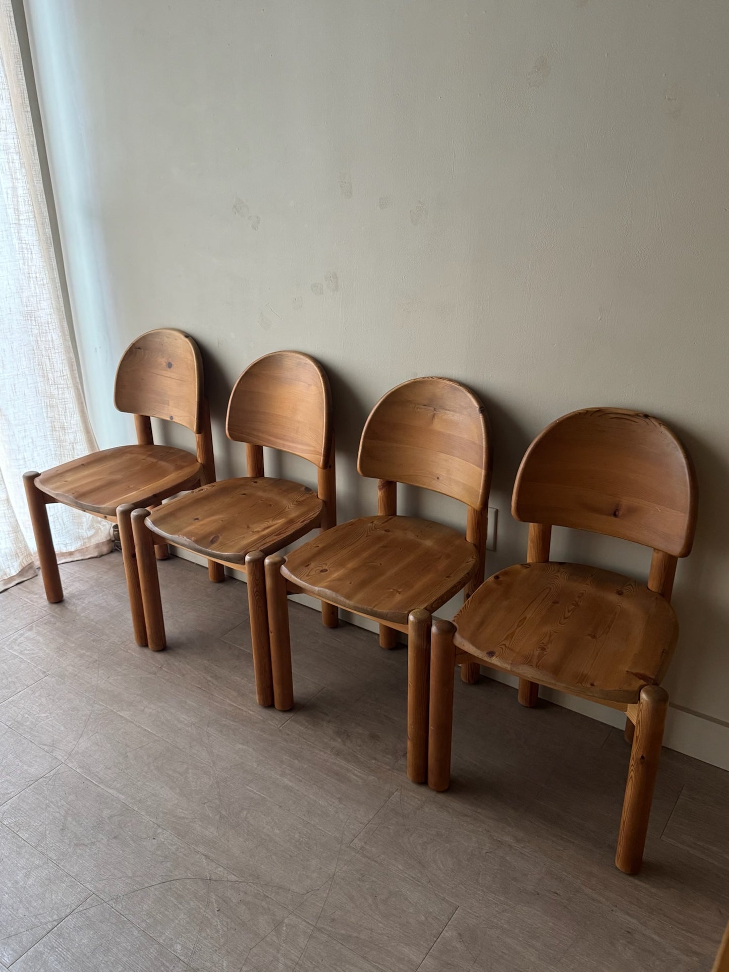 Rainer Daumiller pine dining chairs with matte finish. Sold as a set of 4.