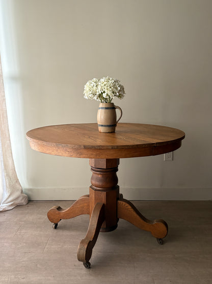 Oak dining table with extensions