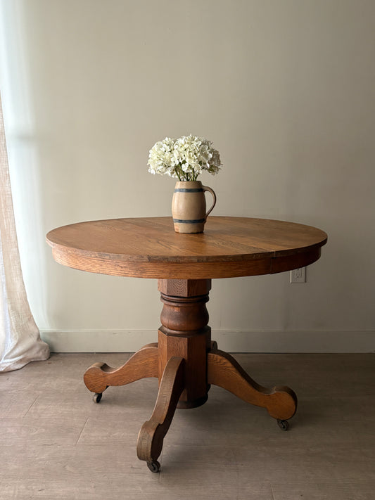 Oak dining table with extensions