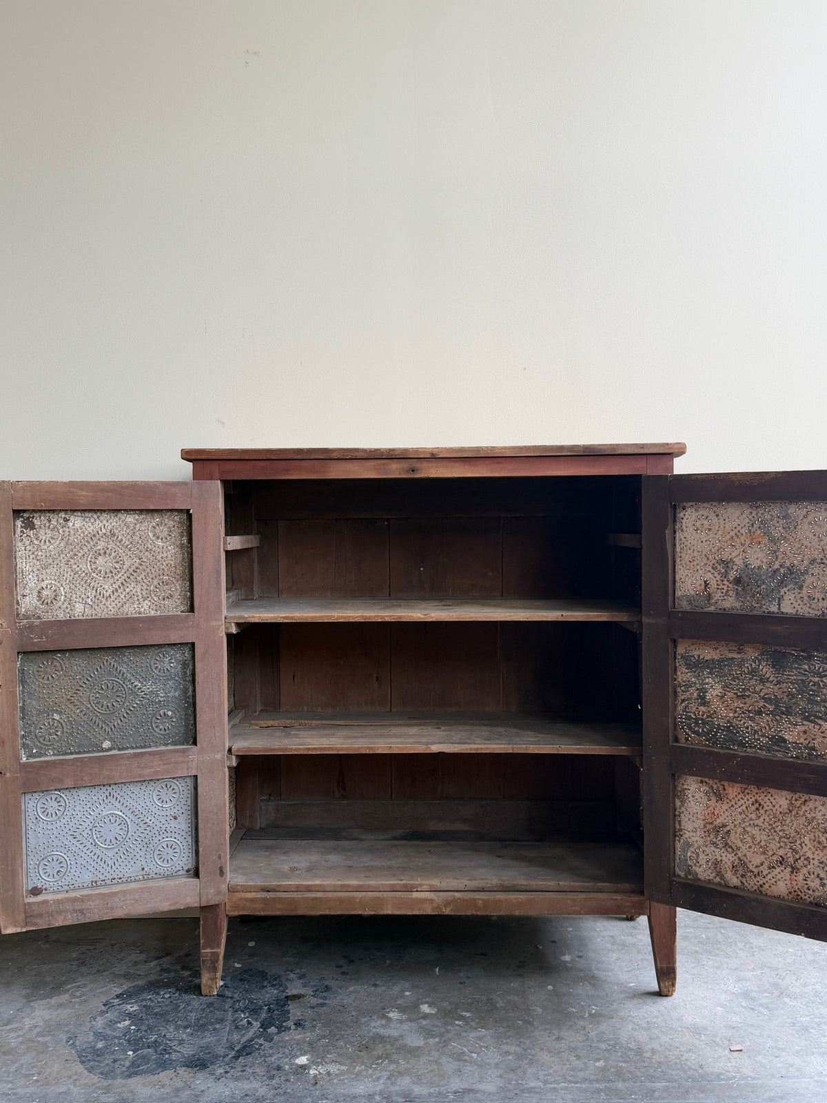 Poplar punched tin cupboard