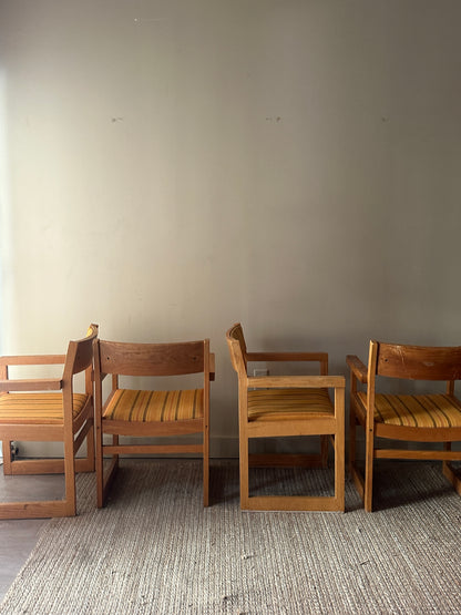 Oak armchairs. Sold individually.