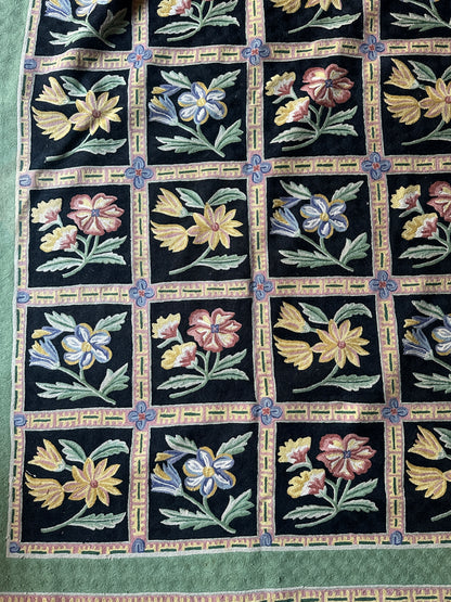 Wool flower rug 5’ x 8’