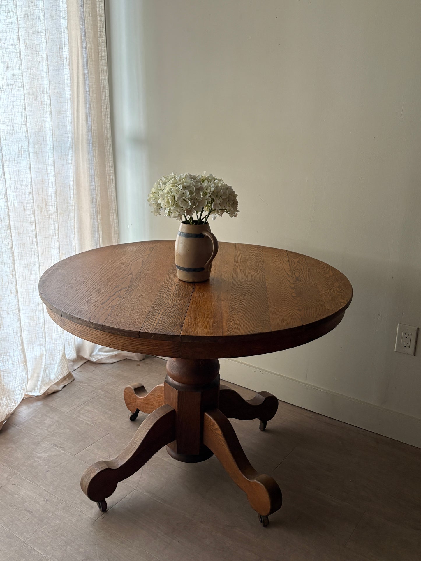 Oak dining table with extensions
