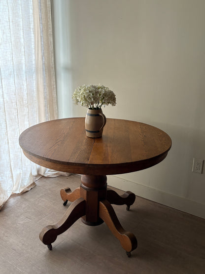 Oak dining table with extensions