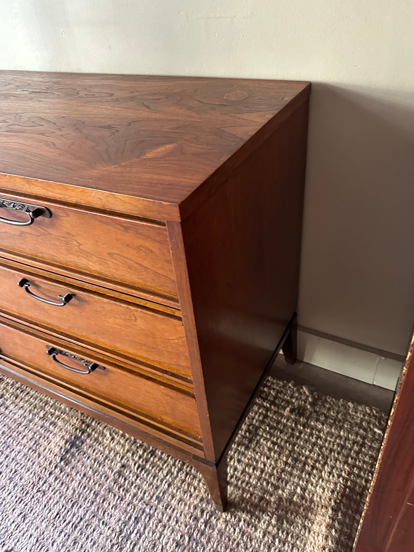Walnut credenza with carved center handles