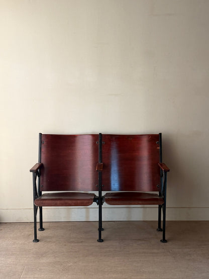 Cast iron and bentwood two-seat folding theater bench