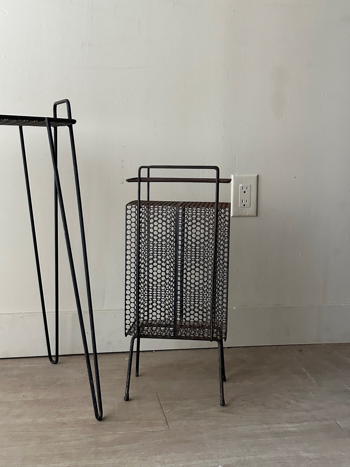 Black metal mesh side table (left)
