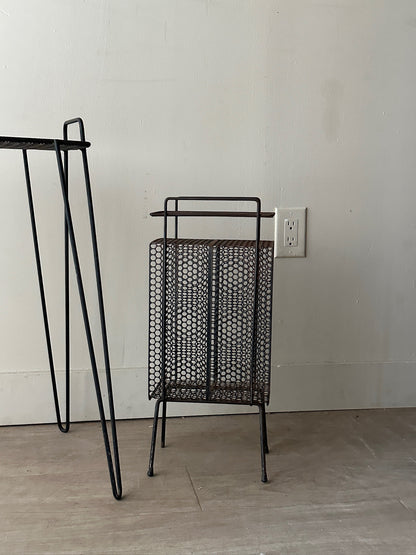 Black metal mesh side table (left)