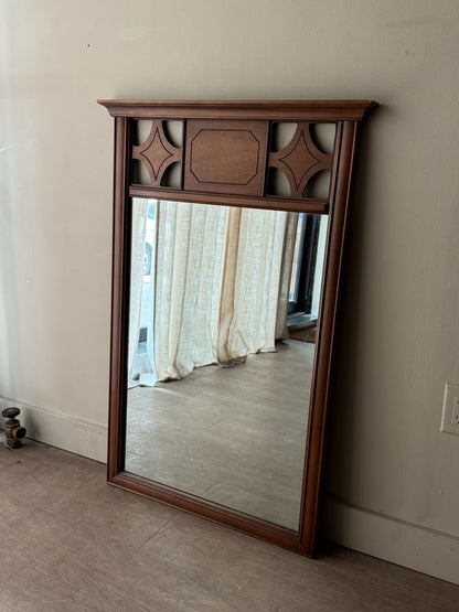Carved walnut mirror