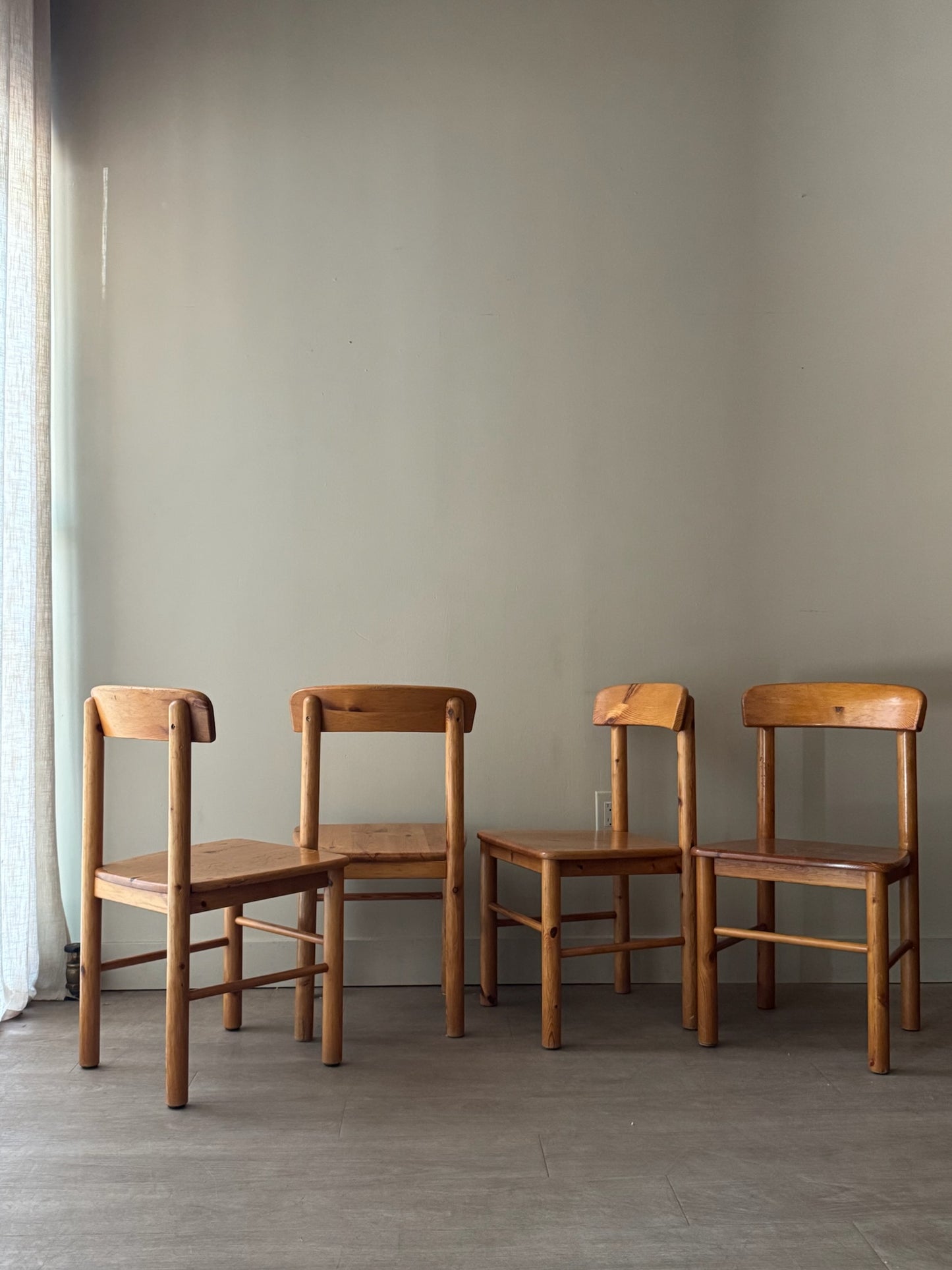Danish pine dining chairs. Sold in pairs.