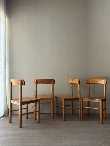 Danish pine dining chairs. Sold in pairs.