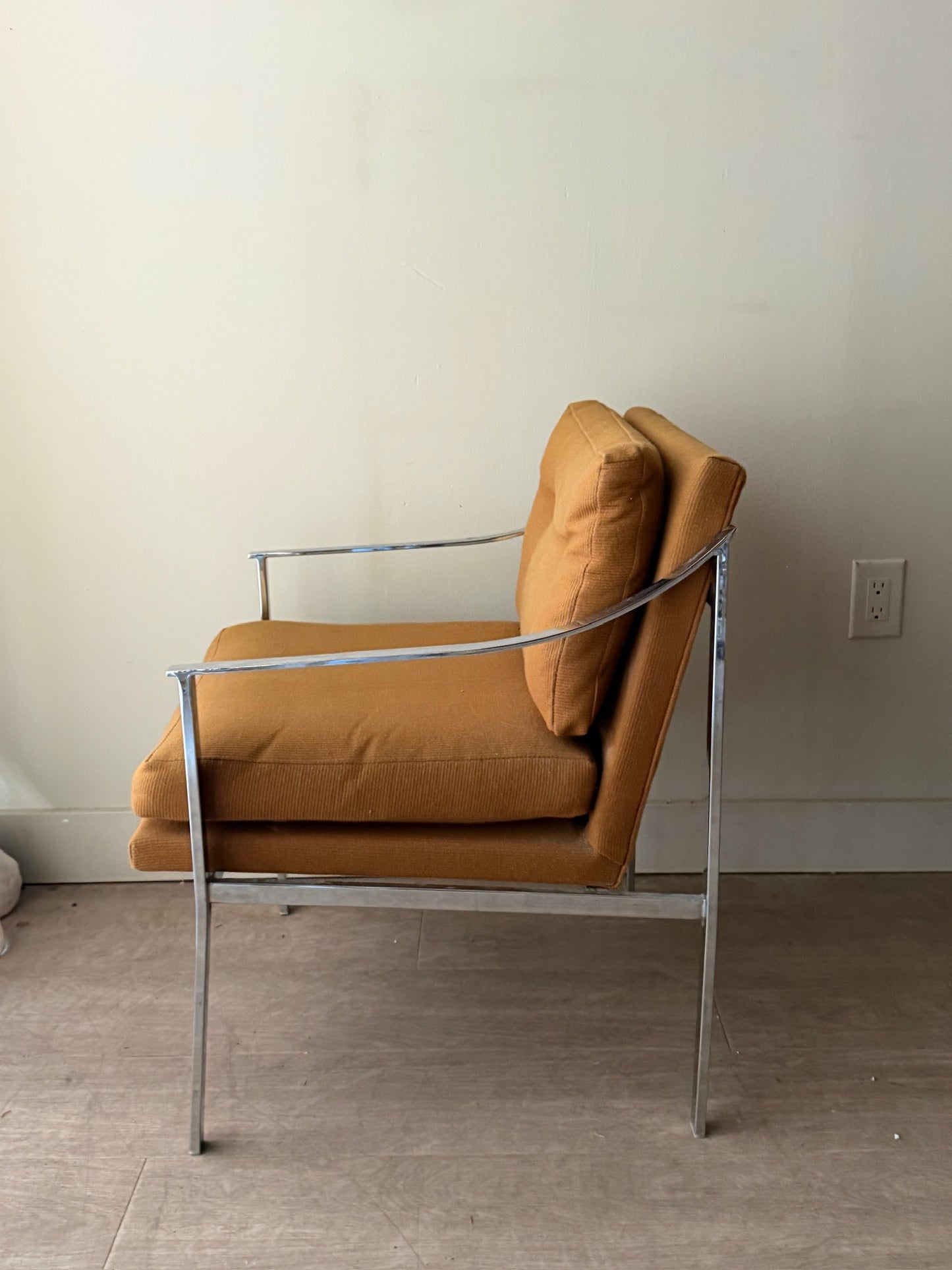 Ochre upholstered chrome armchair