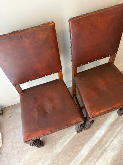 Leather and oak dining chairs with rips. Set of 2.