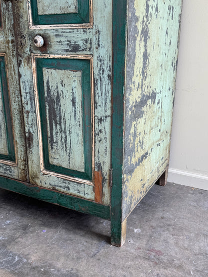 Green painted cupboard