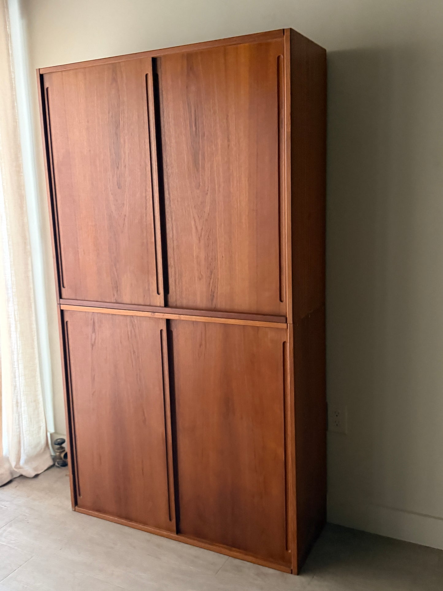 Two piece teak cabinet