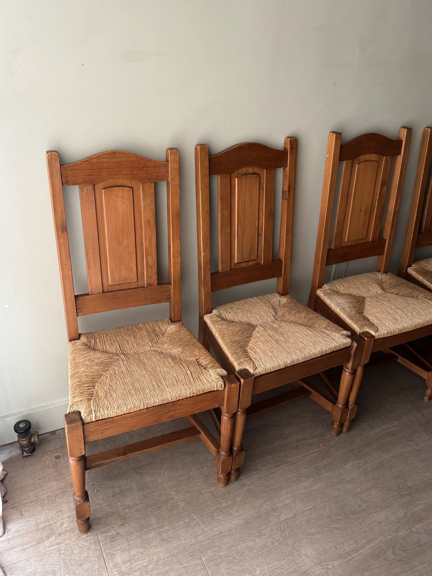 Dutch oak rush seat dining chairs. Sold in pairs.