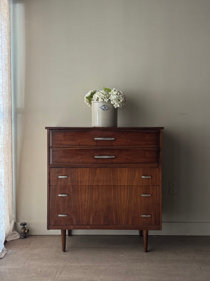 Walnut tallboy with chrome handles