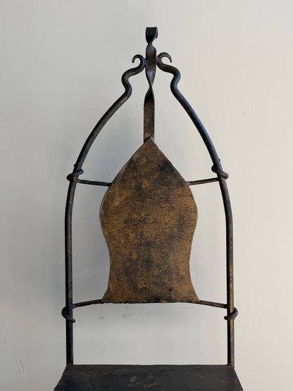 Wrought iron sculptural chairs (right)