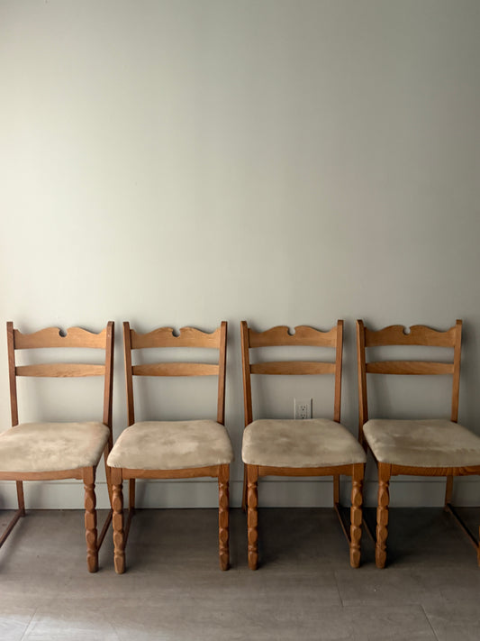 Danish oak dining chairs with suede upholstery. Sold in pairs.