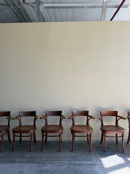 Thonet bentwood arm chairs. Sold in pairs.
