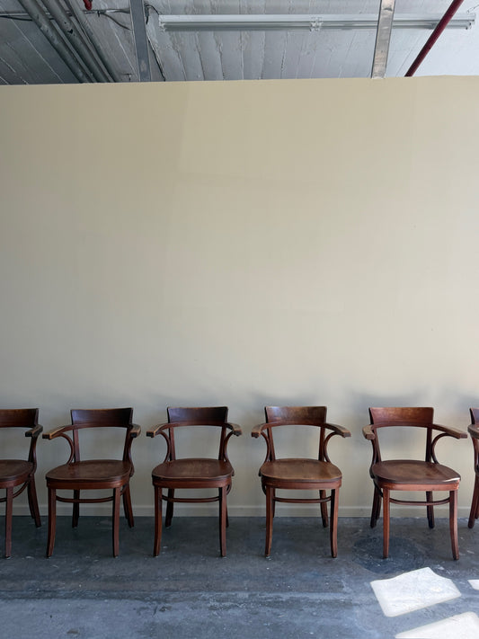 Thonet bentwood arm chairs. Sold in pairs.