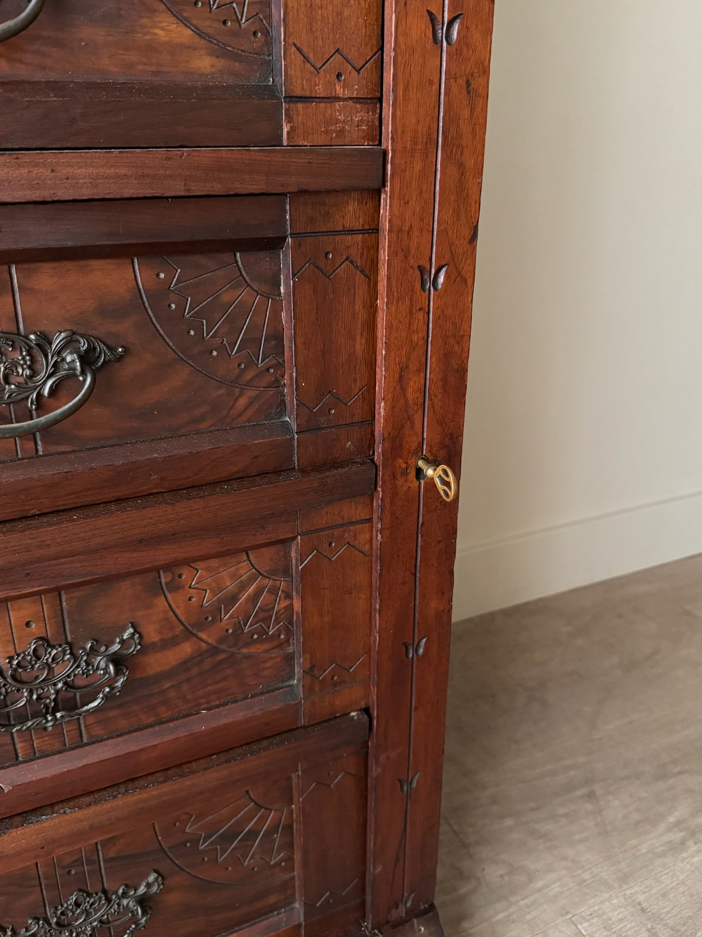 Carved Eastlake walnut dresser with side lock