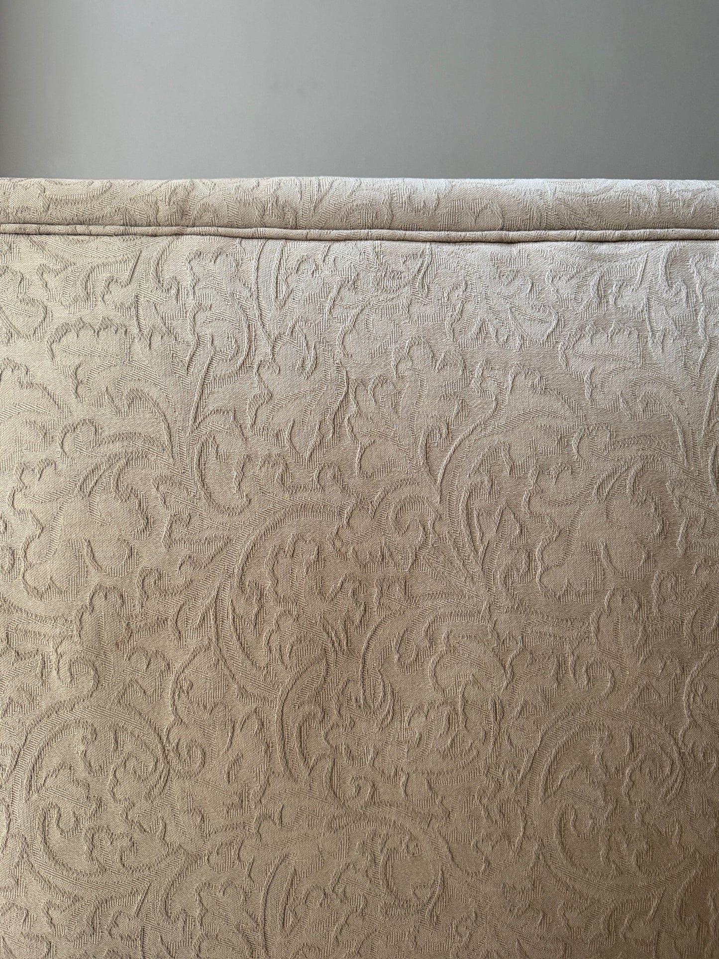 Damask upholstered settee with turned walnut legs