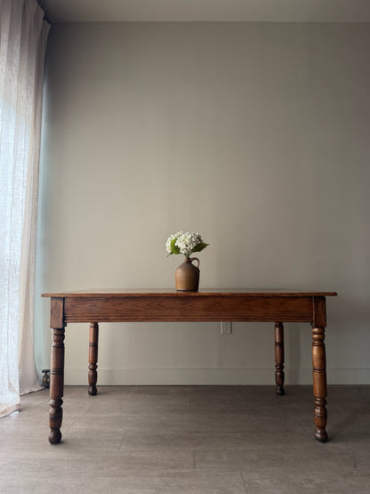 Golden oak dining table
